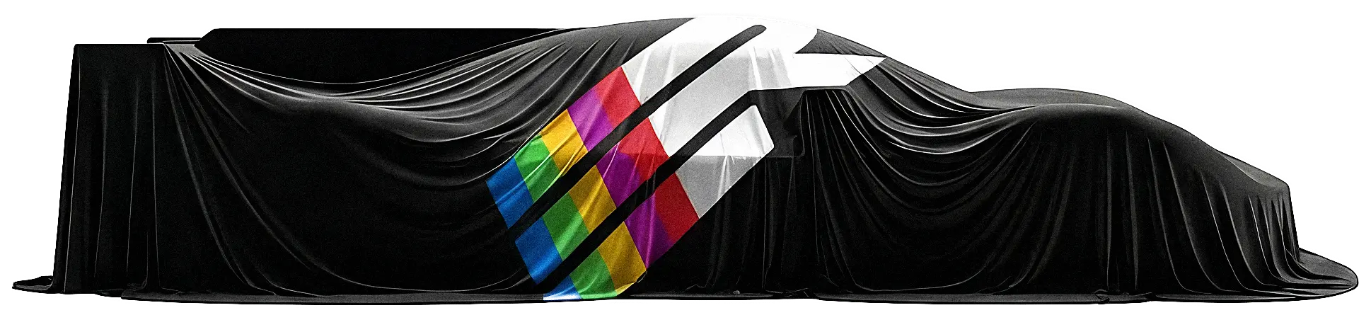 Racecar under a black sheet with a Remix 3 logo